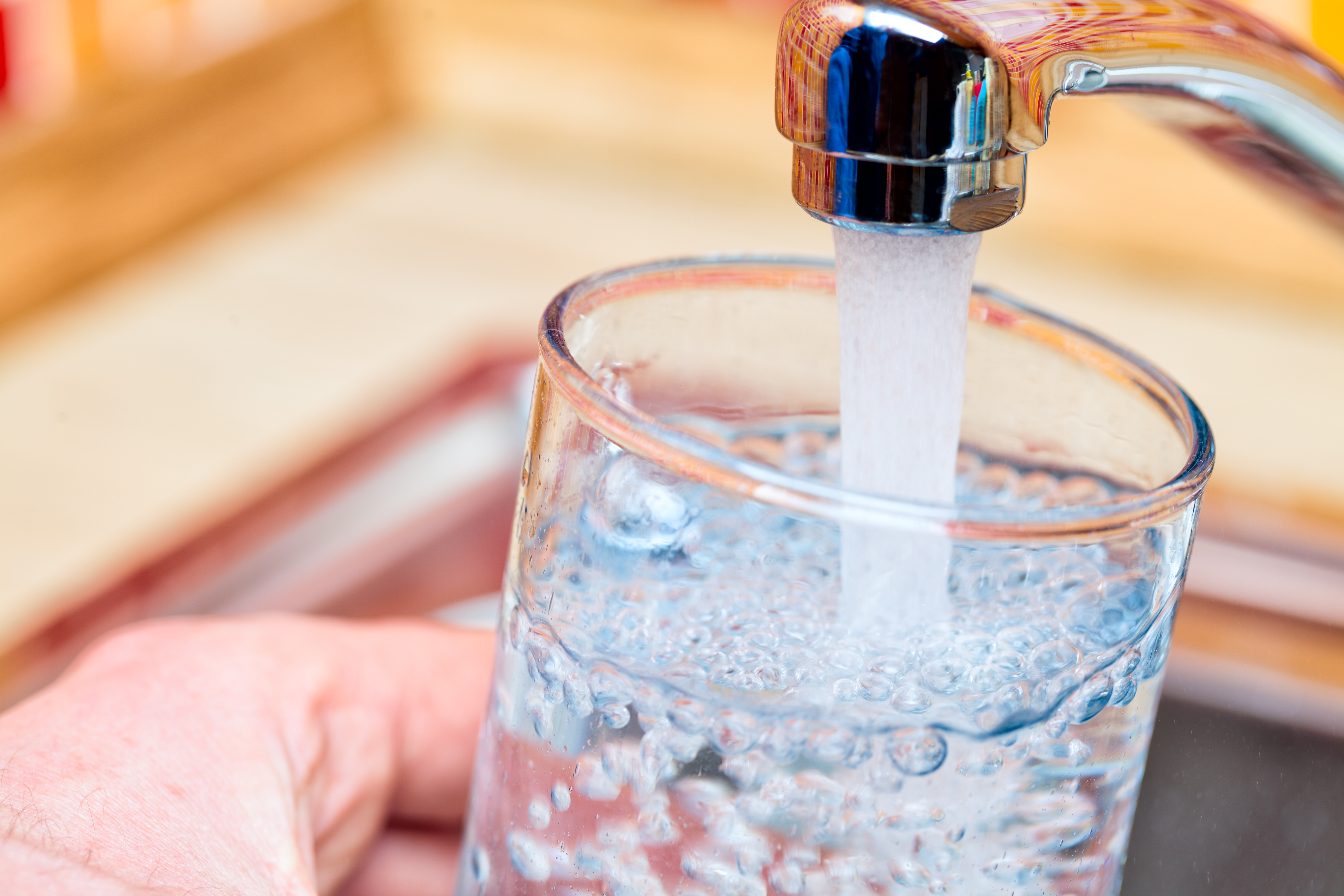 filling up a glass of water